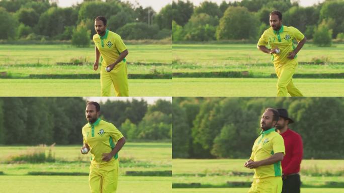 一名穿着黄绿制服的南亚板球运动员在球场上投球的慢动作肖像。职业印度投球手是专注的，目标是击中三柱门与