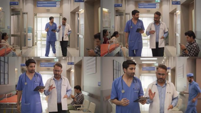 两名印度男医生在医院走廊边走边用平板电脑聊天的慢镜头。两位医学专家在讨论一个病人的治疗