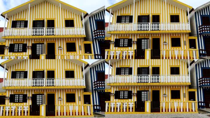 在科斯塔诺瓦海滩，标志性的两层房子被漆成白色和黄色条纹