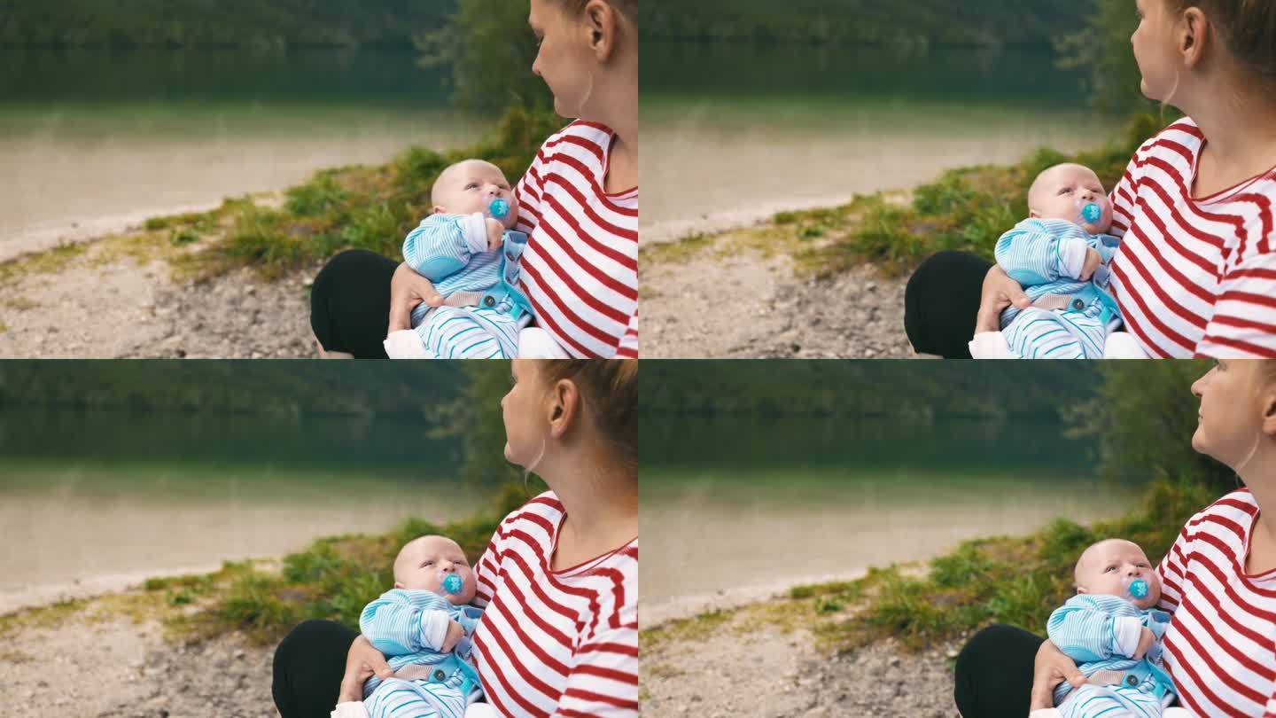 度假期间，可爱的母亲带着刚出生的孩子在博希尼湖附近放松