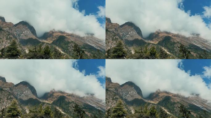 雾笼罩着尼泊尔安纳普尔纳环线的山脉