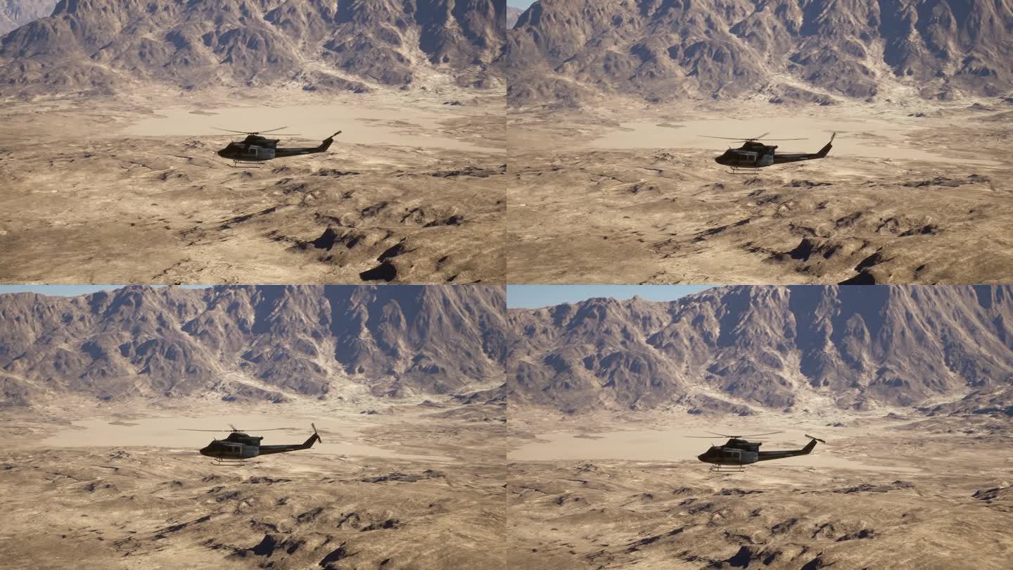 一架直升机飞过沙漠中的山脉