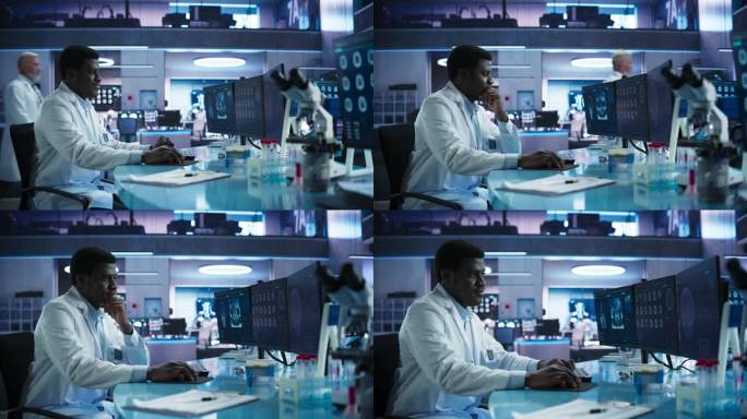 医学研究中心实验室黑人男性神经学家使用台式电脑分析大脑核磁共振扫描。非洲医生研究阿兹海默症患者脑部C