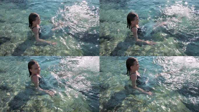 快乐的女孩在湖上游泳，抖腿。4k画面UHD 3840x2160