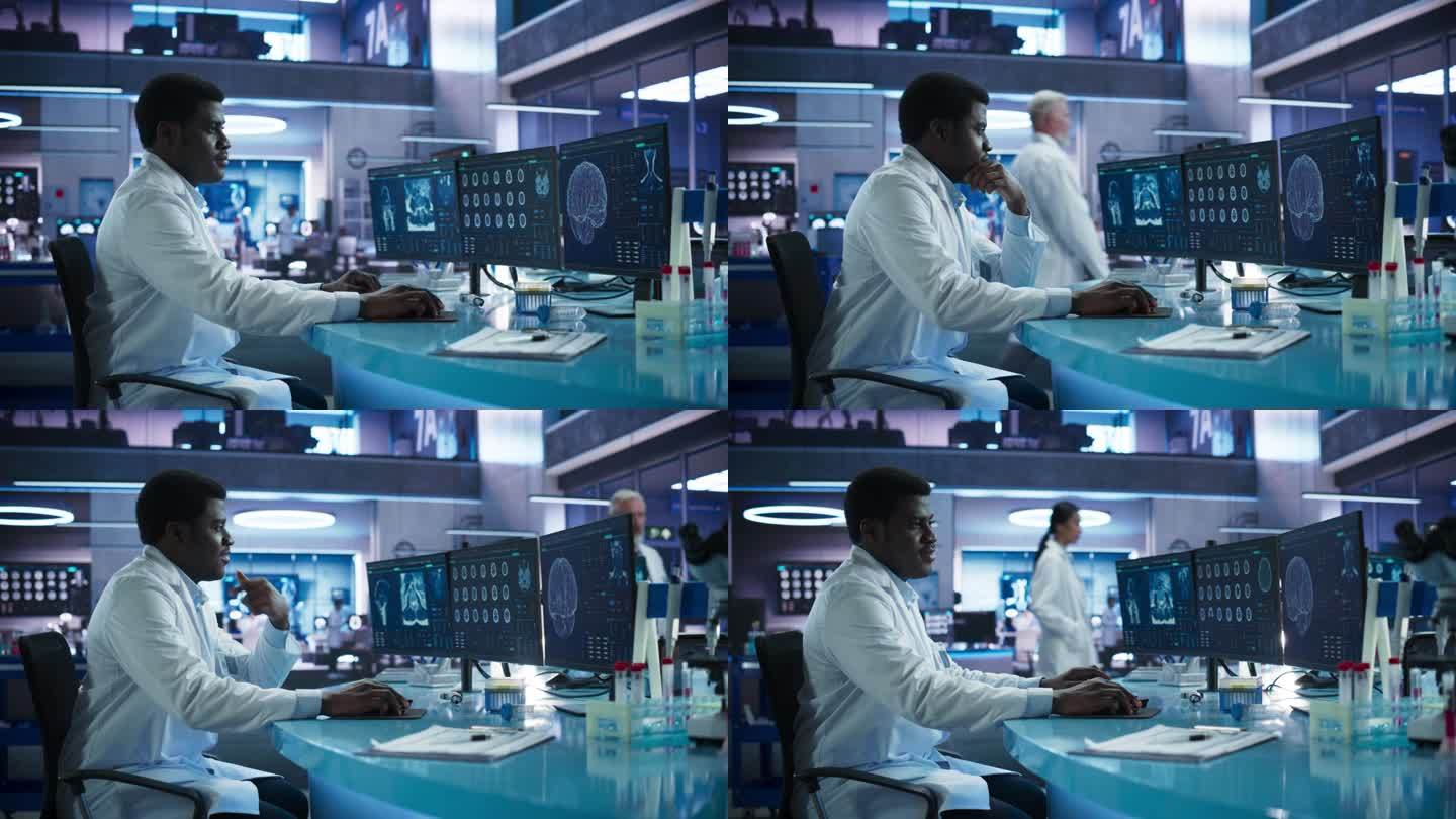 医学研究中心实验室黑人男性神经学家用台式电脑分析脑核磁共振扫描。非洲医生研究脑卒中患者的CT扫描，寻