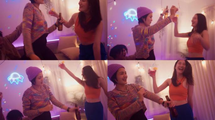 年轻的亚洲女子跳舞，享受派对，喝酒，享受周末庆祝活动。