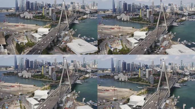 悉尼城市鸟瞰图，澳新军团大桥与早晨的交通和城市天际线