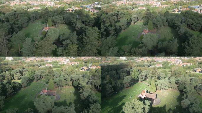 在英国英格兰诺福克郡的怀蒙德姆，树木环绕的怀蒙德姆公墓全景鸟瞰图。