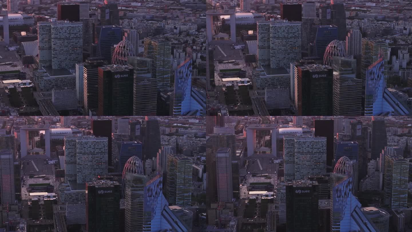 黄昏时现代商业区未来主义建筑的航拍幻灯片和全景镜头。拉德芳斯的金融中心。法国巴黎