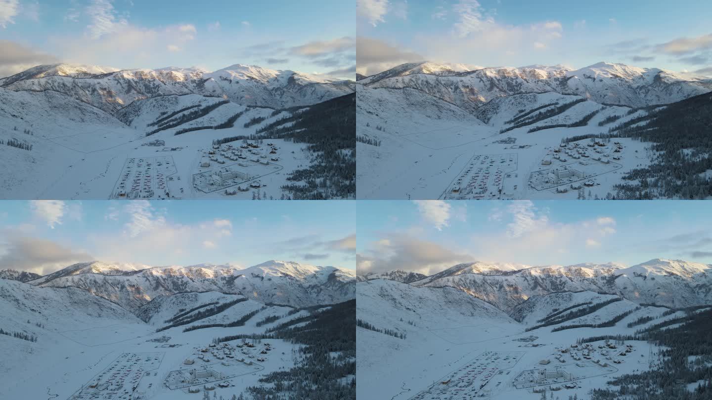 新疆冬天喀纳斯雪山日出大全景航拍