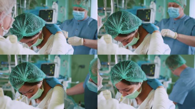 男医生为住院女病人在分娩过程中注射硬膜外麻醉。脊髓麻醉。医生在腰椎穿刺