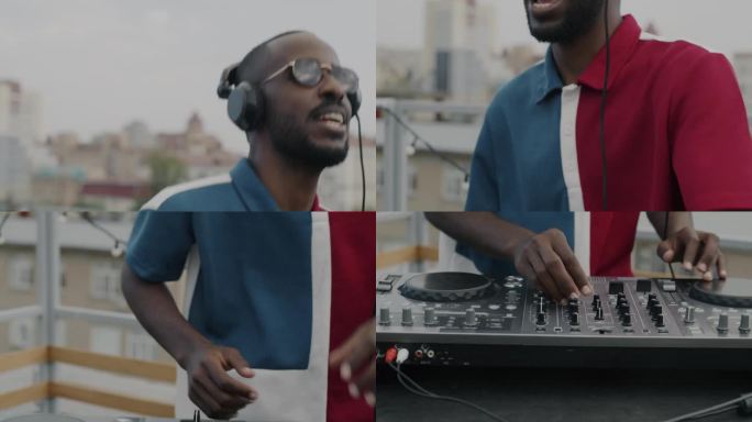 男DJ戴着耳机使用混音设备在露天派对上创作音乐