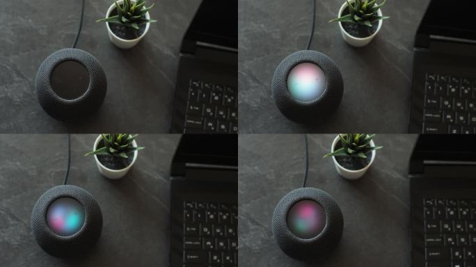 使用HomePod Mini扬声器，智能扬声器会对人类的指令做出反应，并通过不断变化的灯光发出注意信