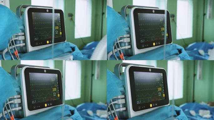 医院手术室的心率监测仪。医院医用生命体征监护仪在麻醉手术监护上的应用。心电图。屏幕上的病人心跳。手术