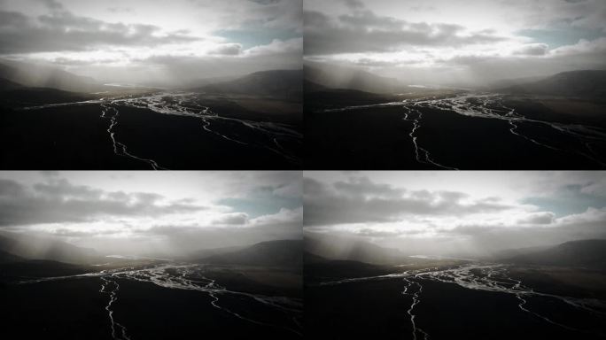 空中托尔山谷，冰川河流经黑色火山冲积平原，thorsmörk壮观的景色喜怒无常的冰岛景观