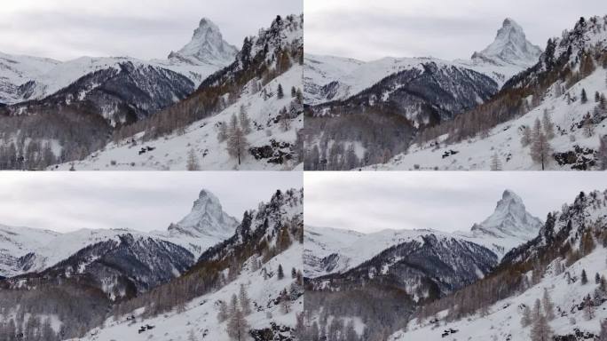 在采尔马特开启风景如画的空中无人机小屋瑞士最著名的雪山马特洪峰10月11月大雪冬季在攀登高峰向上运动