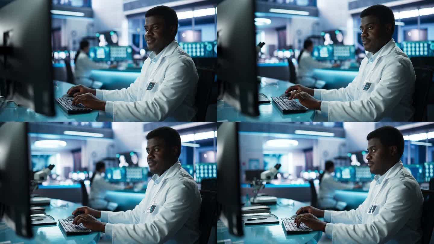 现代医院医学研究实验室黑人男医生使用台式电脑。非裔美国医生检查病人的测试结果、药物处方、症状史。