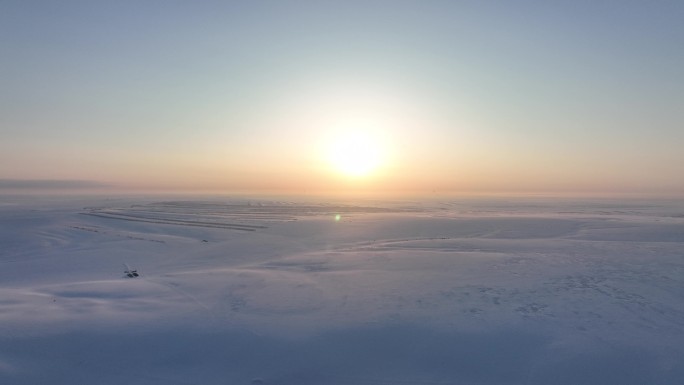 呼伦贝尔雪原田野夕阳自然风景