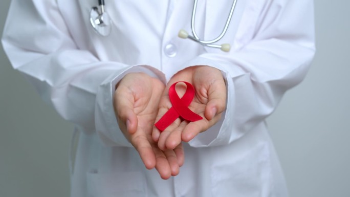 12月世界艾滋病日、获得性免疫缺陷综合征、多发性骨髓瘤癌症宣传月和全国红丝带周的红丝带医生。保健和世