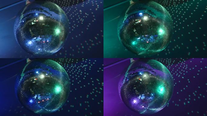 迪斯科球旋转，反射出五颜六色的反光