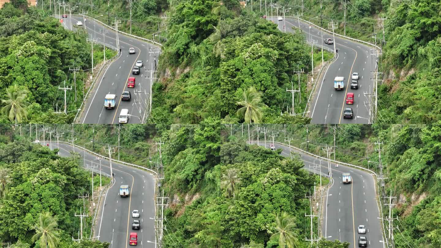 普吉岛白天飞行时间超过山区交通道路航拍全景4k泰国