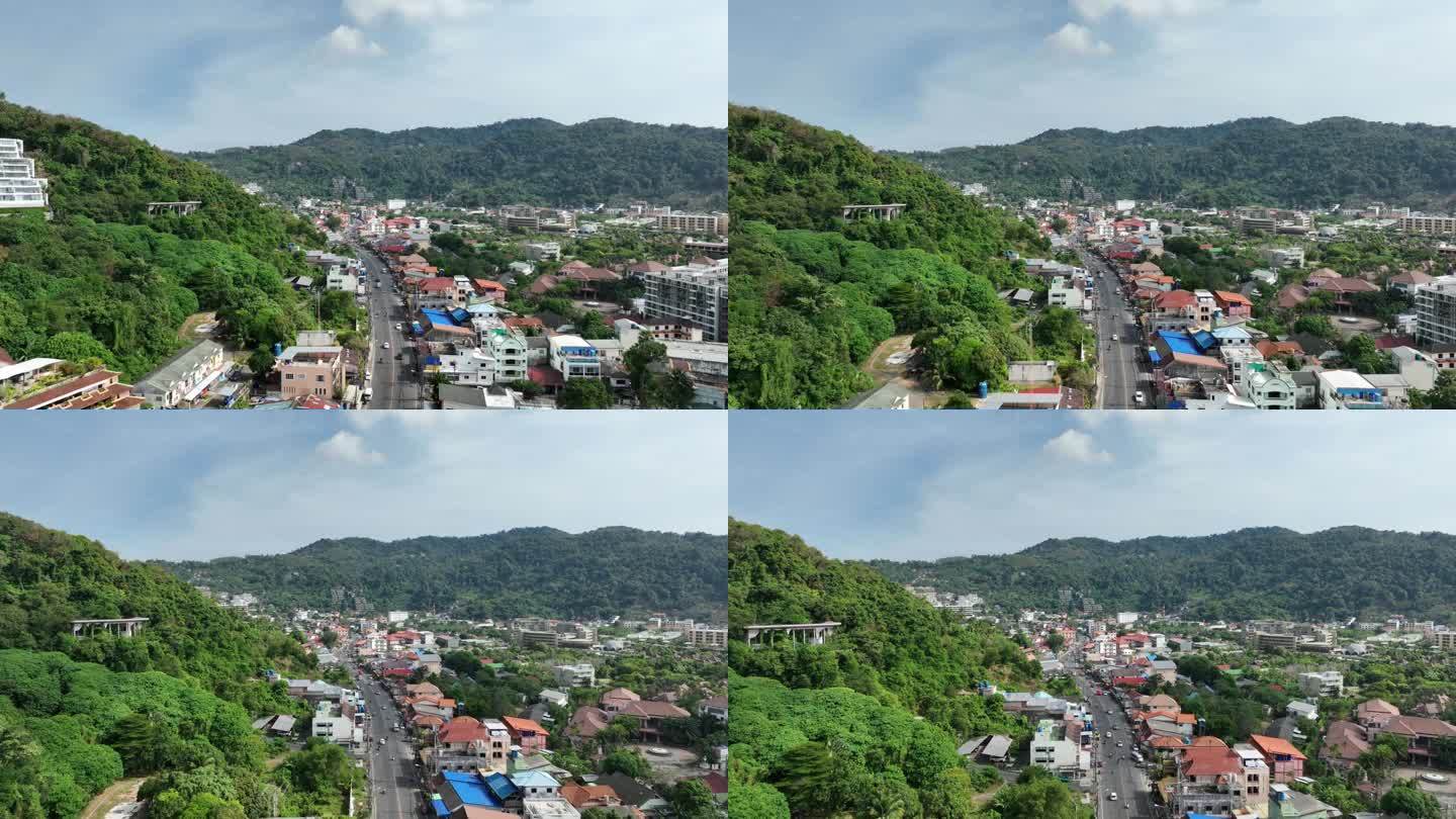 晴天飞越普吉岛海岸线城镇交通道路航拍全景4k泰国