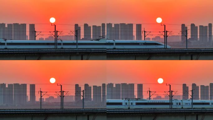 中国高铁和谐号复兴号动车黄昏日落穿过城市