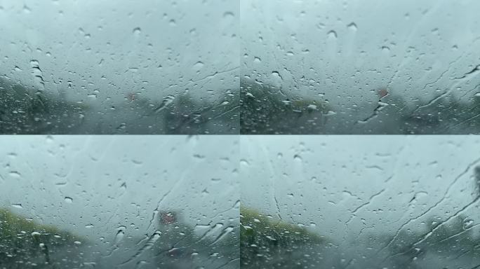 高速公路上汽车行驶雨玻璃