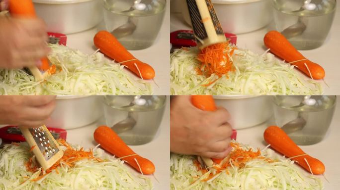 一个男人在家煮酸菜。磨胡萝卜。特写，从侧面看。