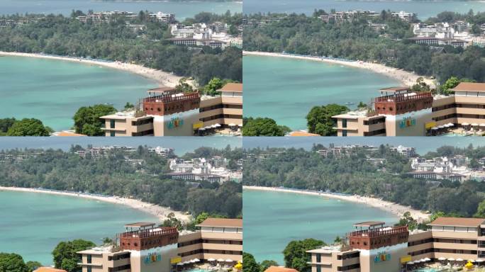 阳光明媚的一天飞越普吉岛海岸线海滩海湾酒店外部航拍全景4k泰国
