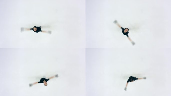 一位女运动员在溜冰场上旋转的俯视图
