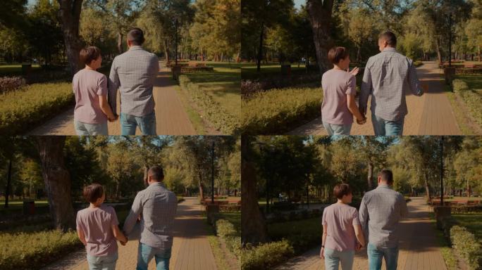 浪漫的听障夫妇手拉手，在公园散步的背影