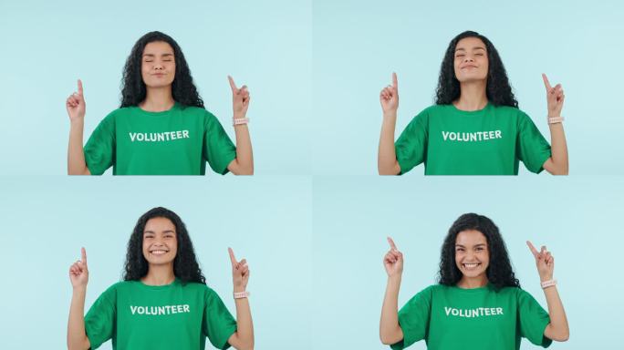 妇女，志愿者的脸和指向空间显示广告和非政府组织的慈善信息。蓝色背景，工作室和对模拟生态项目，非营利组