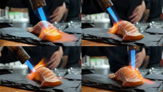 正宗的日本三文鱼Aburi寿司是由专业厨师制作的。4k拍摄