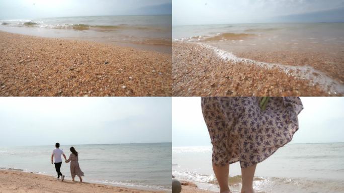情侣在沙滩散步奔跑浪漫大海