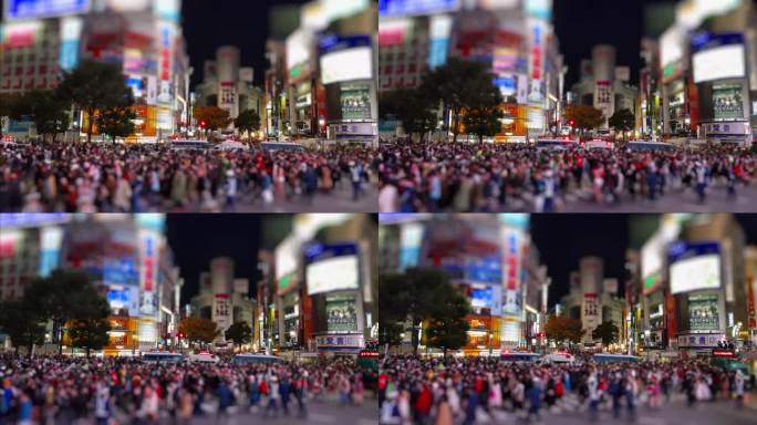 东京街道上的人群。建筑物上的大型空广告显示屏