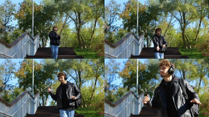 时髦的年轻人走下楼梯，在公园里戴着耳机听音乐，一边跳舞。的生活方式。秋季散步的概念。实时概念。