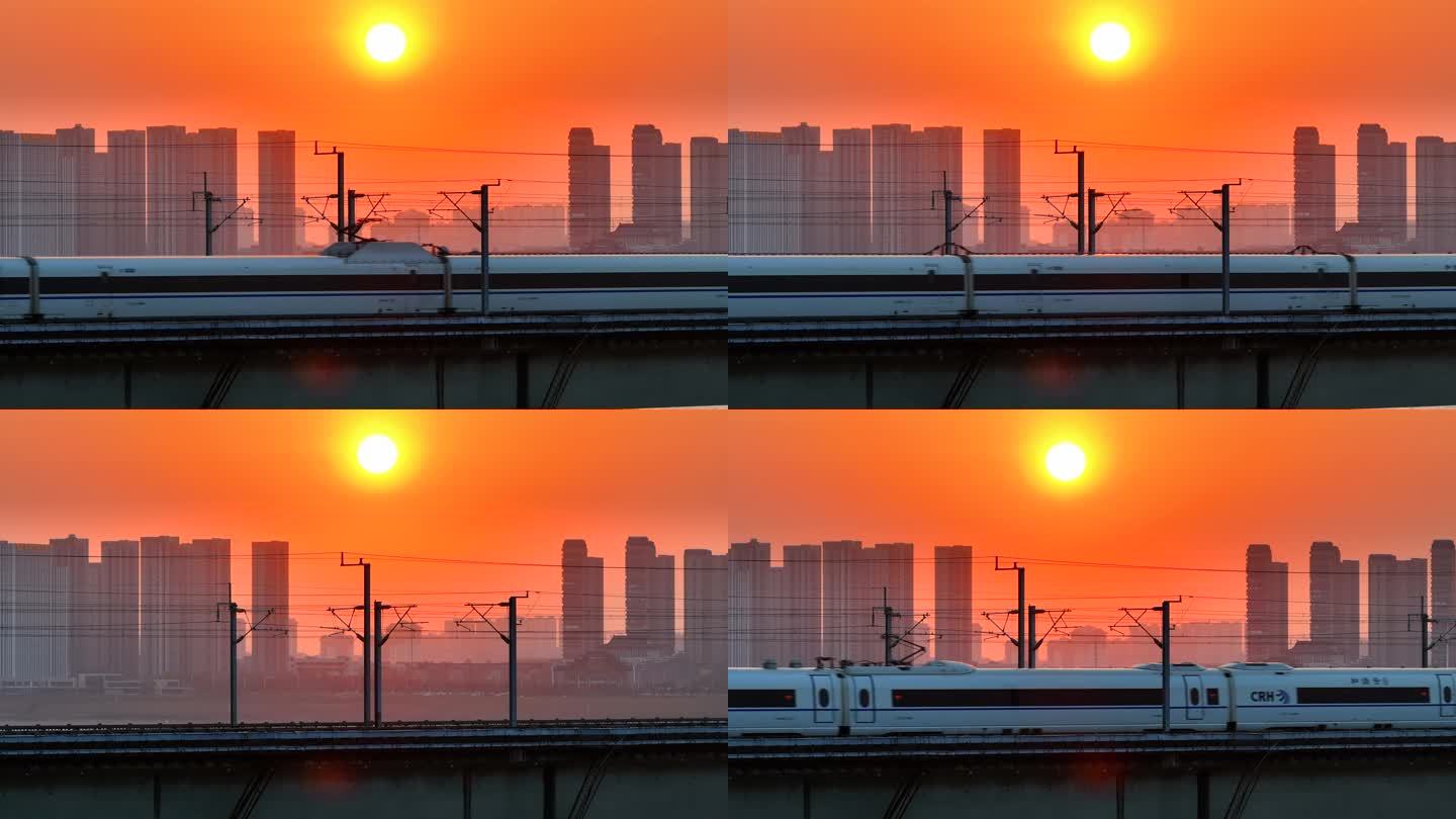 黄昏夕阳下的高铁经过城市大桥