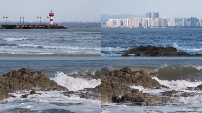 海边的城市灯塔海浪