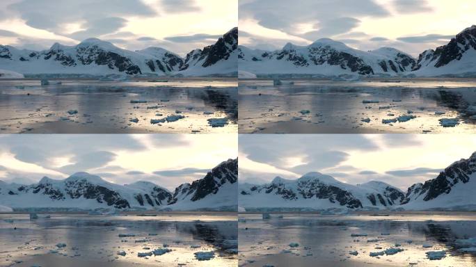冰山。融化的冰山碎片在海洋，海洋。巨大的冰川。北极圈的冰川正在融化。北极的冰川。水面上美丽的倒影。南