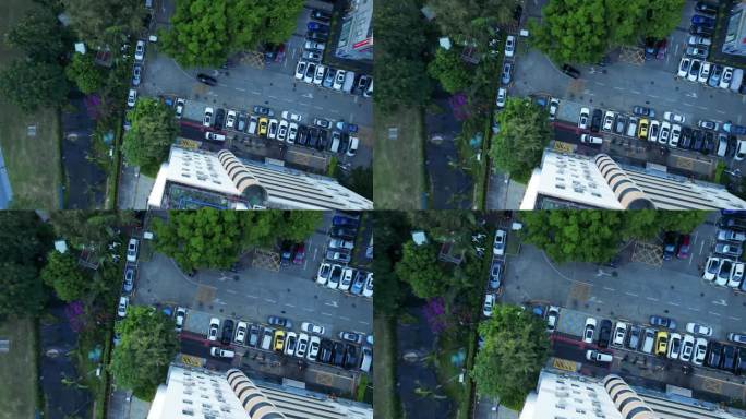 顶视航拍园区停车场汽车驶过