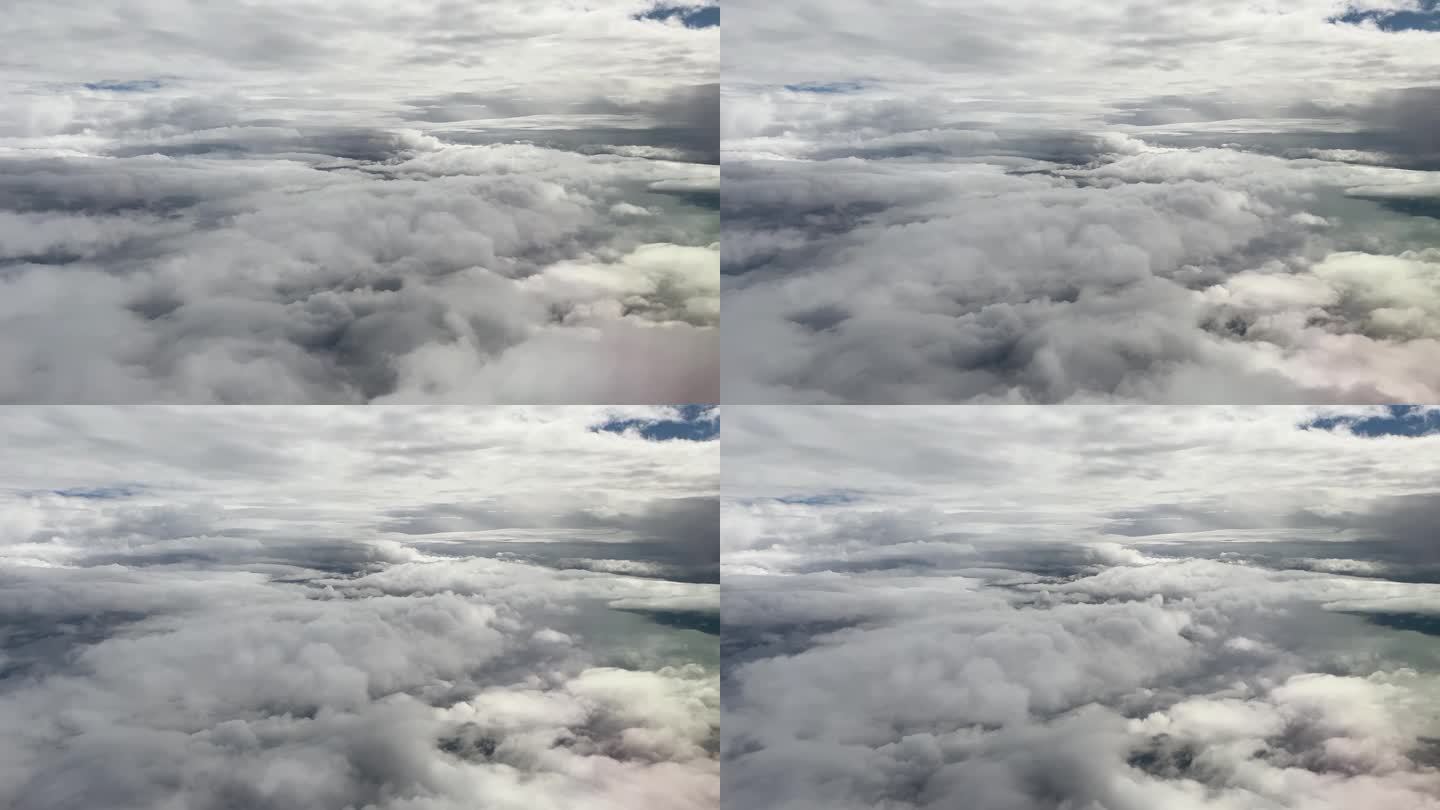 乘客从云层之间的飞机上看到的景象