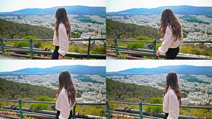 从利卡贝托斯山上俯瞰雅典的年轻女子。