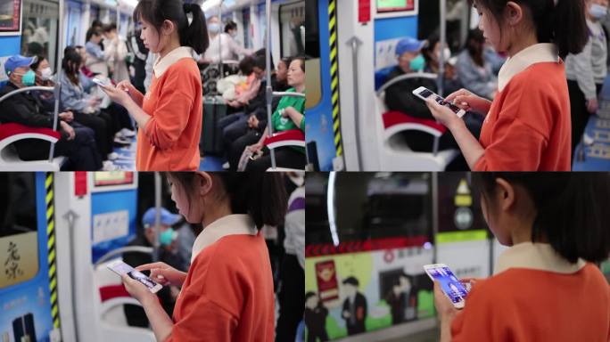 年轻女性在地铁看手机刷短视频