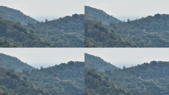 阳光明媚的一天飞越普吉岛山地丛林森林航拍全景4k泰国