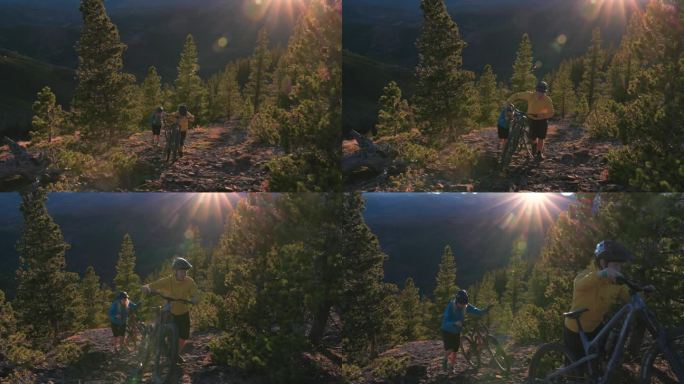 骑山地自行车的朋友爬陡峭的山坡