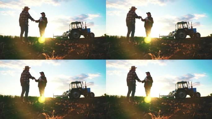 春天的早晨，拖拉机在农田上播种的季节，种植着小麦、黑麦等粮食作物，男农民和女农艺师正在农田里握手