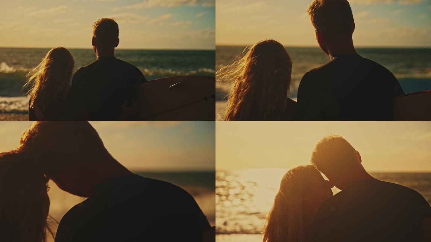 热情洋溢的冲浪夫妇拥抱亲吻，看着海浪