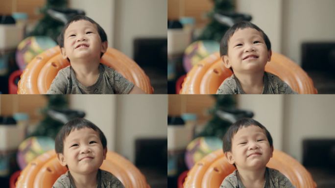 纯真与欢乐:一个亚洲小孩的特写照片中的真实情感。