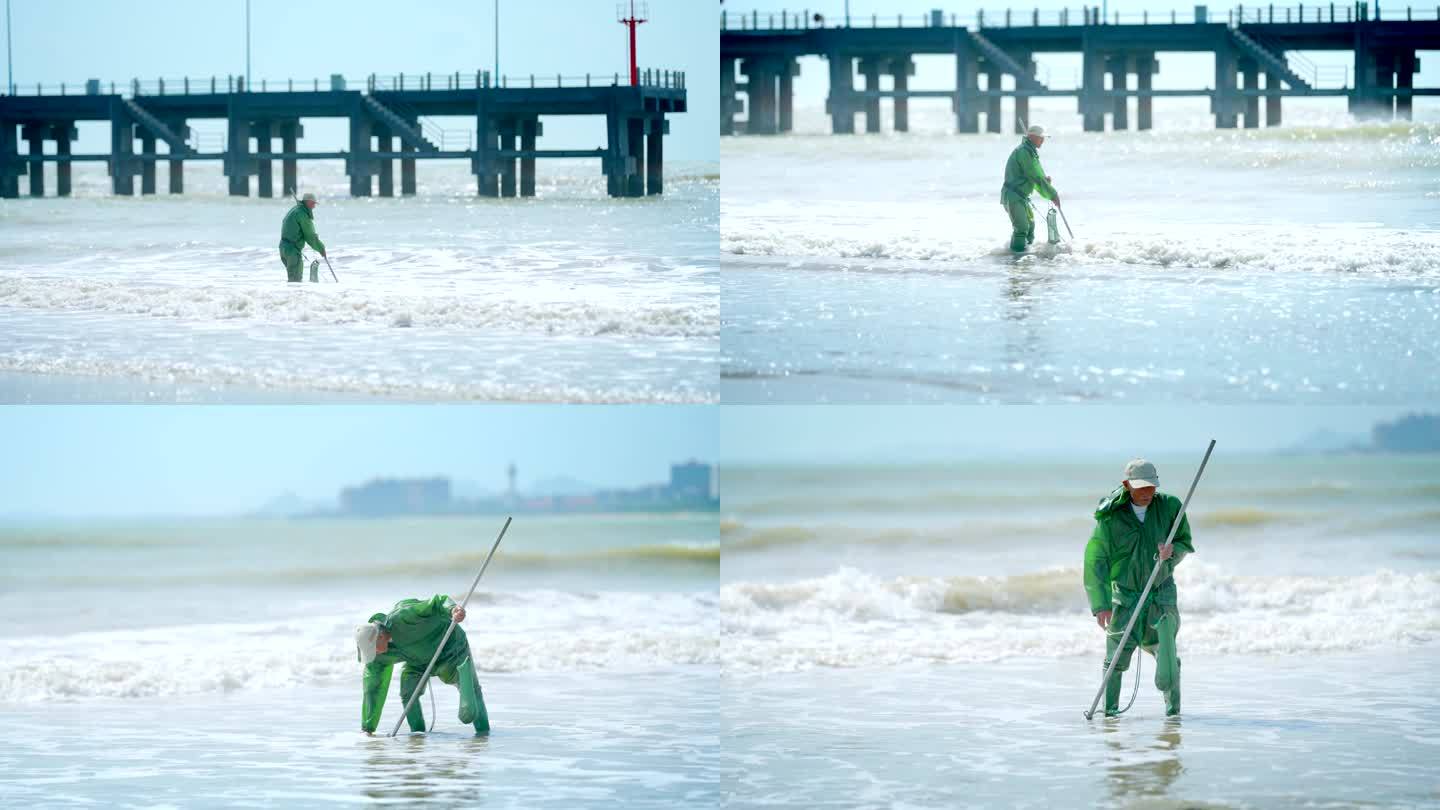 高清4k拍摄老人在海边赶海捕鱼